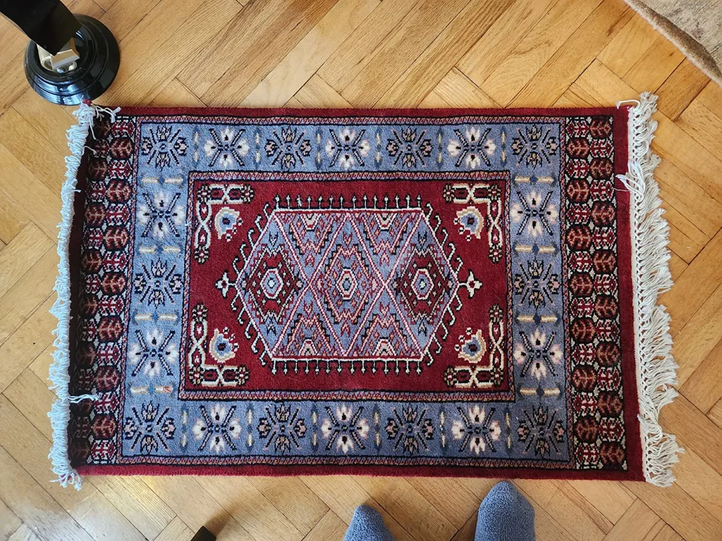 Amma Carpets hand knotted red small rug