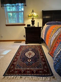 Blue Persian Rug in bedroom