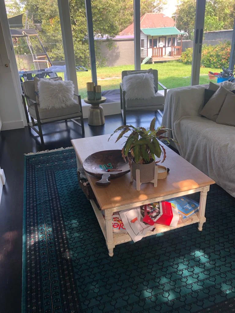 Amma Carpets hand knotted rug in living area