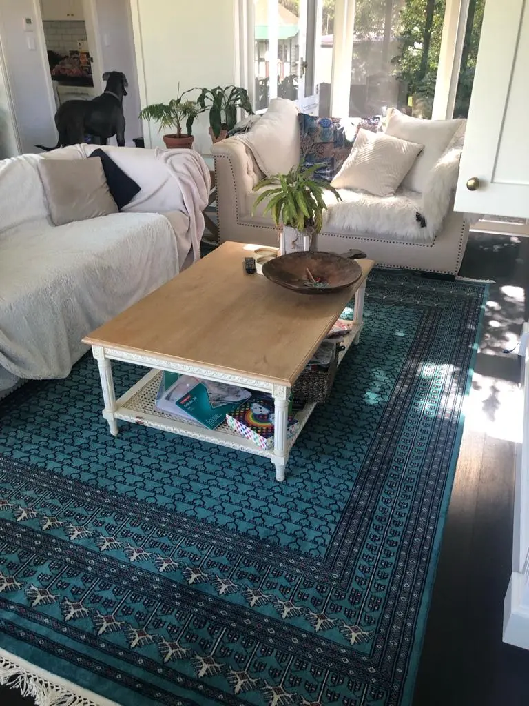 Amma Carpets hand knotted rug in living area