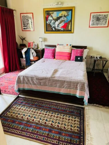 Amma Carpets hand knotted rug in bedroom
